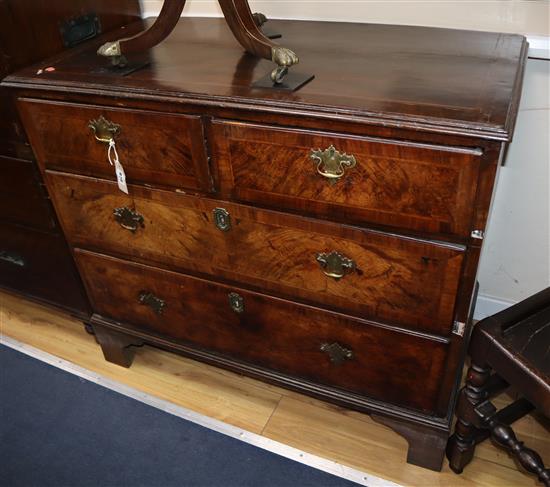 A George II walnut four drawer chest W.99cm